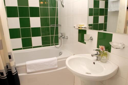 Imagen de la habitación del Hotel 7 Days Kamyanets-Podilskyi. Foto 8