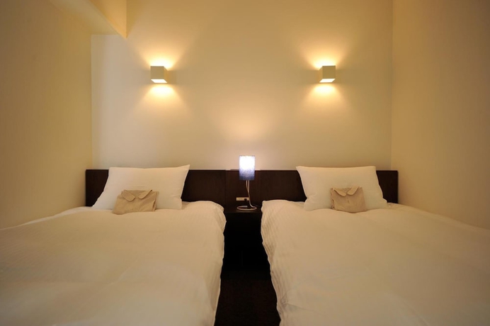 Imagen de la habitación del Hotel 7 Days Plus. Foto 10