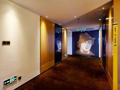 Imagen general del Hotel 7 Days Premium Jingjiang Fuhai New World Automobile Terminal Branch. Foto 4