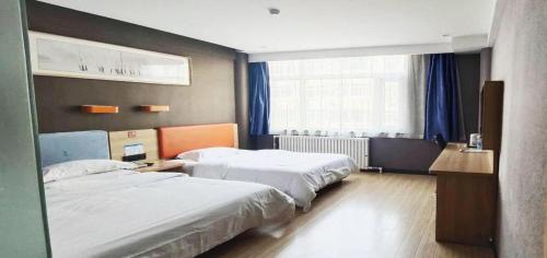 Imagen general del Hotel 7 Days Premium Qingdao Keji Street Taishan Road Metro Station. Foto 14