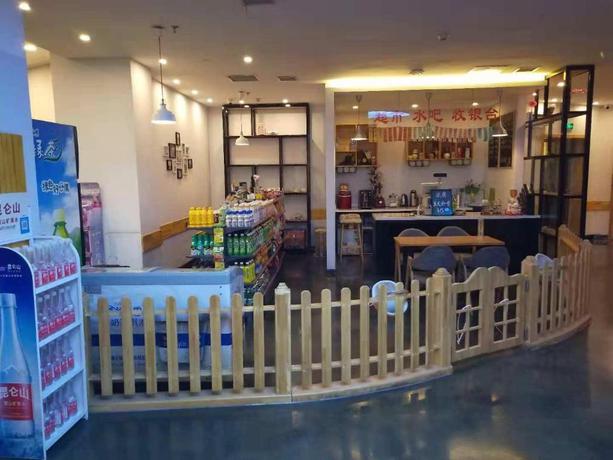 Imagen general del Hotel 7 Days Premium&middot; Zhoushuizi Airport Wal-Mart. Foto 5