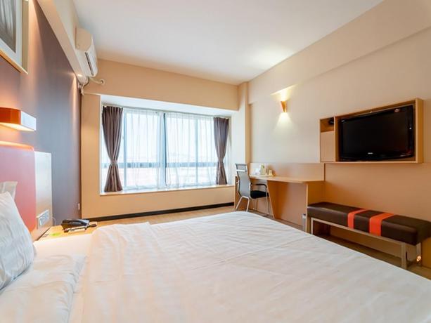 Imagen de la habitación del Hotel 7 Days Premium&middot;Xiamen Airport. Foto 5