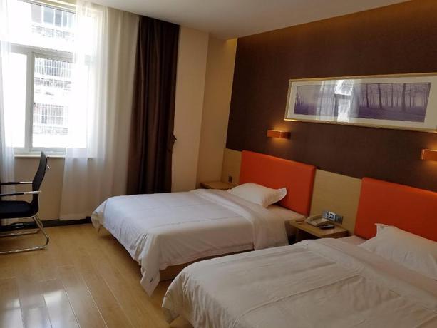 Imagen de la habitación del Hotel 7 Days Premium&middot;Yantai Penglai New Bus Terminal. Foto 5