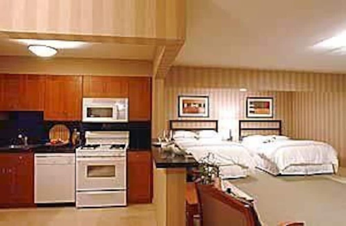 Imagen de la habitación del Hotel 7 Springs Inn And Suites. Foto 9