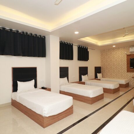 Imagen de la habitación del Hotel 7 Vachan Lawns And Banquet. Foto 12