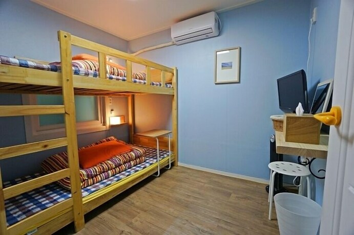 Imagen de la habitación del Hotel 710 Guest House Yellow. Foto 24