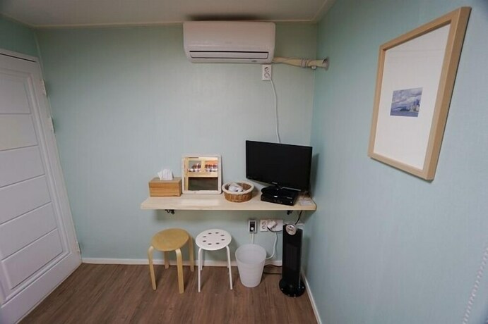 Imagen de la habitación del Hotel 710 Guest House Yellow. Foto 35