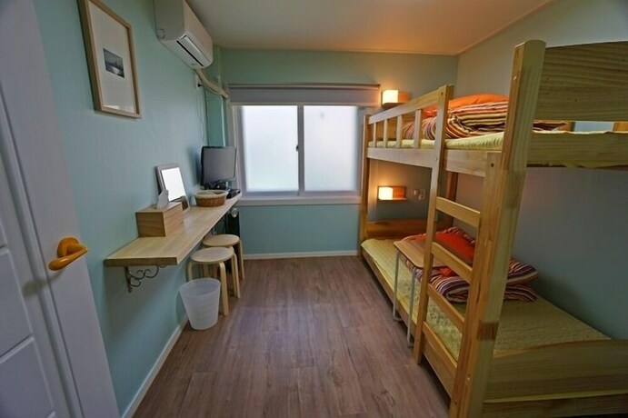 Imagen de la habitación del Hotel 710 Guest House Yellow. Foto 36