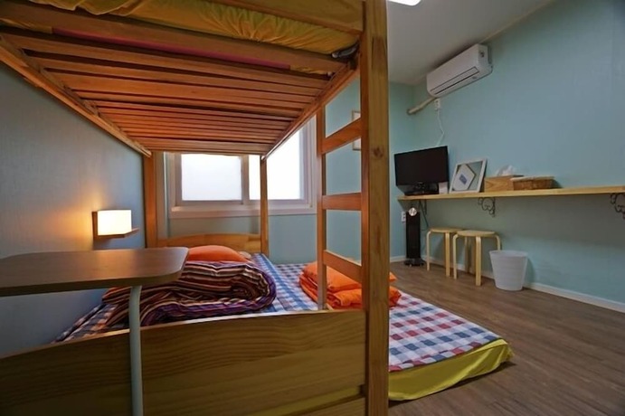 Imagen de la habitación del Hotel 710 Guest House Yellow. Foto 37