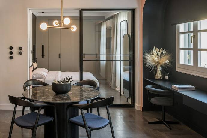 Imagen de la habitación del Hotel 72 AD Suites. Foto 11