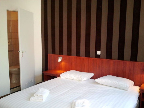 Imagen de la habitación del Hotel 74. Foto 9