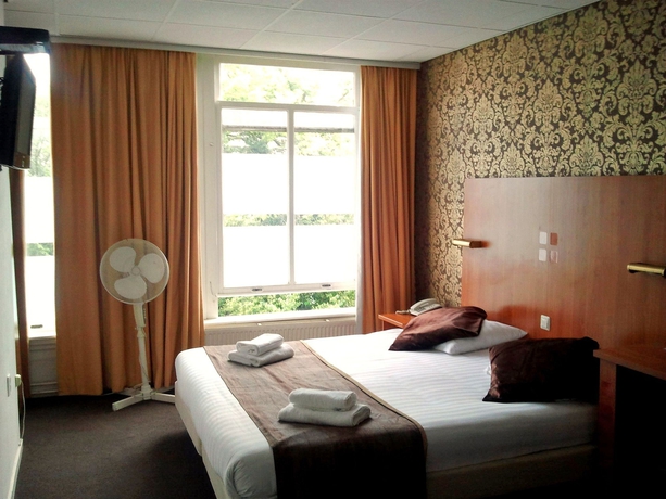 Imagen de la habitación del Hotel 74. Foto 12