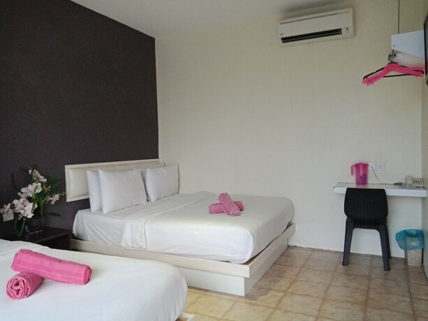 Imagen de la habitación del Hotel 77 Rawang. Foto 17