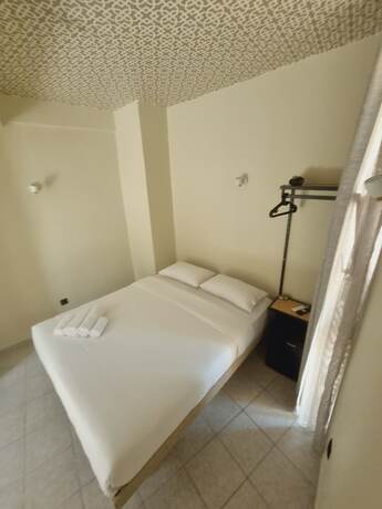 Imagen de la habitación del Hotel 7ATHENS. Foto 11