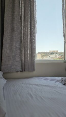 Imagen de la habitación del Hotel 7ATHENS. Foto 13