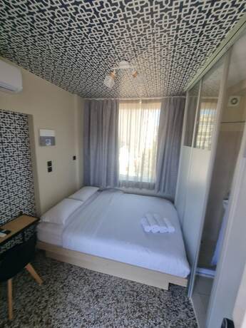 Imagen de la habitación del Hotel 7ATHENS. Foto 18