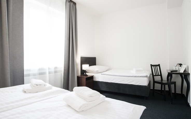 Imagen de la habitación del Hotel 7Days BandB. Foto 4