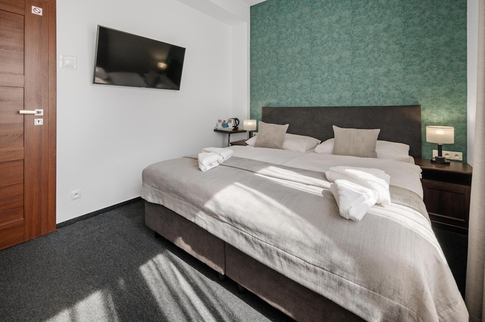 Imagen de la habitación del Hotel 7Days BandB. Foto 5