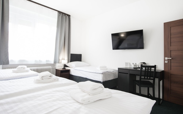 Imagen de la habitación del Hotel 7Days BandB. Foto 9