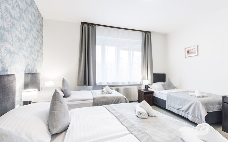 Imagen de la habitación del Hotel 7Days BandB. Foto 10