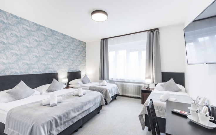 Imagen de la habitación del Hotel 7Days BandB. Foto 11