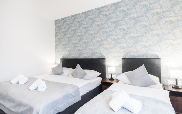 Imagen de la habitación del Hotel 7Days BandB. Foto 12