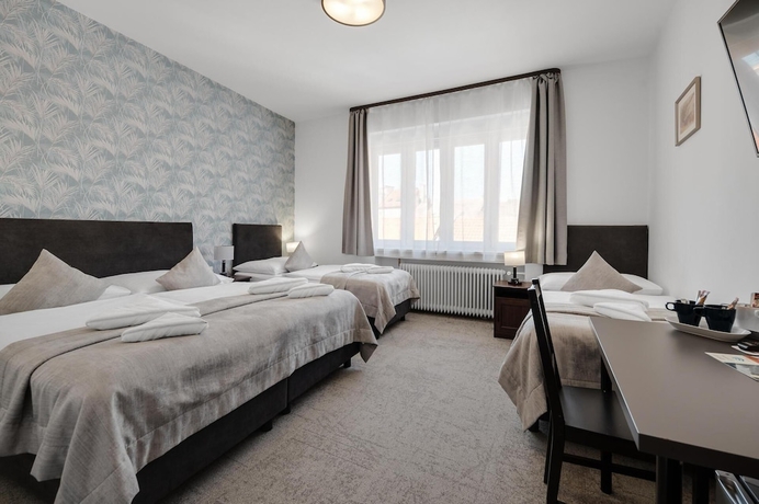 Imagen de la habitación del Hotel 7Days BandB. Foto 14