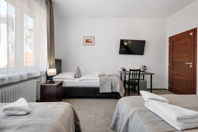 Imagen de la habitación del Hotel 7Days BandB. Foto 16