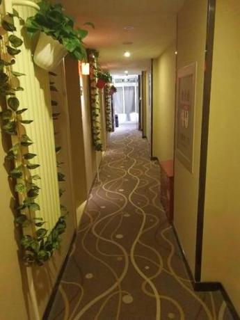 Imagen de los interiores del Hotel 7Days Premium Beijing Xidan Lingjing Hutong Metro Station Branch. Foto 6