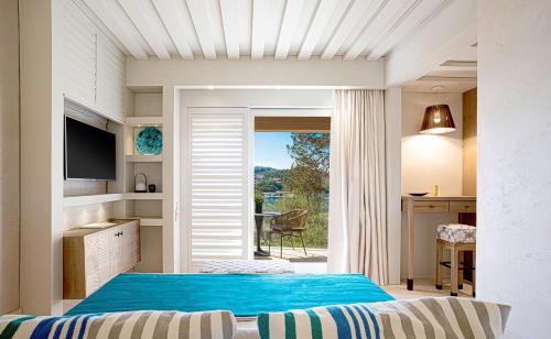 Imagen de la habitación del Hotel 7Pines Resort Sardinia-A Destination By Hyatt. Foto 10