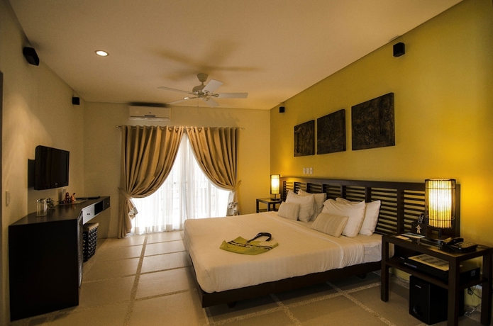 Imagen de la habitación del Hotel 7Stones Boracay. Foto 13