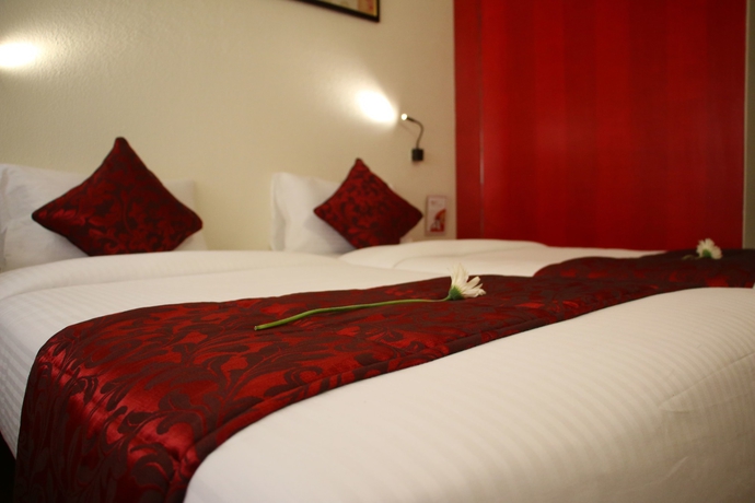 Imagen de la habitación del Hotel 7apple Hotels Aurangabad. Foto 9