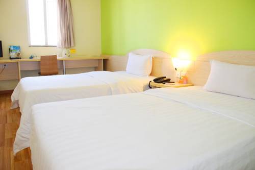 Imagen de la habitación del Hotel 7days Inn Guangzhou Keyun Road. Foto 9