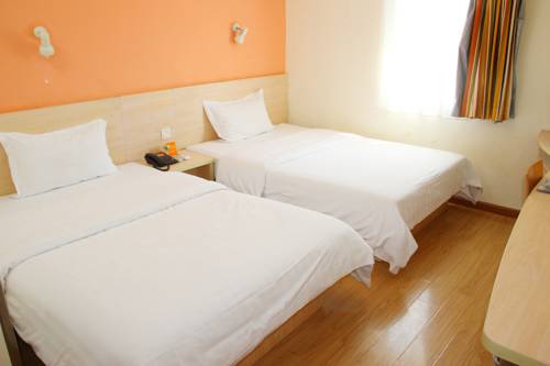 Imagen de la habitación del Hotel 7days Inn Kunming Railway Station. Foto 1