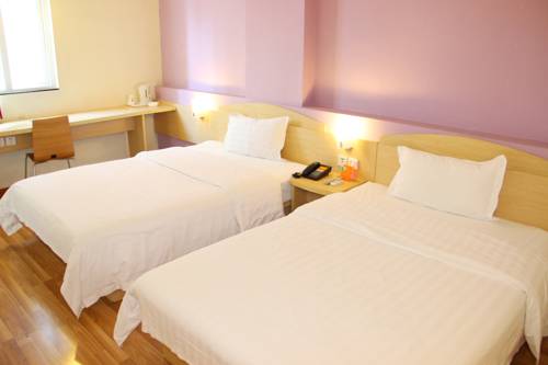 Imagen de la habitación del Hotel 7days Inn Luzhou Sichuan Luzhou Road Chunhui Road. Foto 1