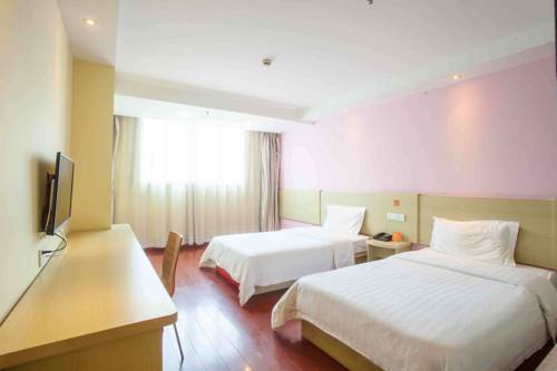 Imagen de la habitación del Hotel 7days Inn Tianjin Teda 4th Street Binhai Internati. Foto 1
