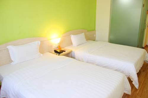 Imagen de la habitación del Hotel 7days Inn Zhengzhou Zhongzhou Avenue Zhengbian Roa. Foto 2