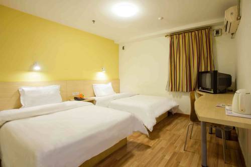 Imagen de la habitación del Hotel 7days Inn Zhumadian Tianzhongshan Tianzhongshan Av. Foto 1