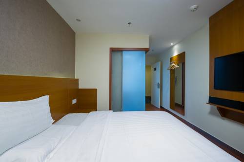 Imagen de la habitación del Hotel 7days Premium Guilin Seven Star International Exhi. Foto 4