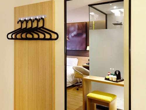 Imagen de la habitación del Hotel 7days Premium Rongcheng High Speed Rail Station. Foto 4