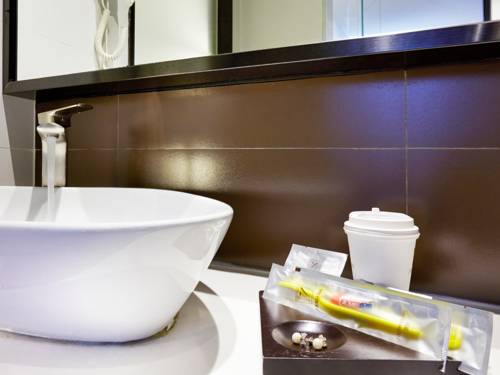 Imagen de la habitación del Hotel 7days Premium Rongcheng High Speed Rail Station. Foto 6