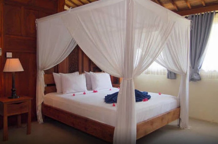 Imagen de la habitación del Hotel 7seas Cottages. Foto 22