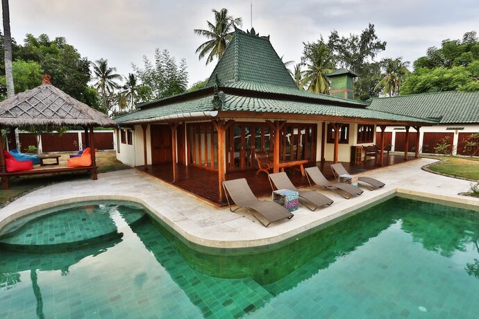 Imagen de la habitación del Hotel 7seas Cottages. Foto 26