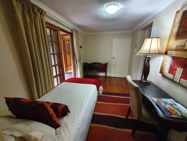 Imagen de la habitación del Hotel 7th Street Guesthouse. Foto 2