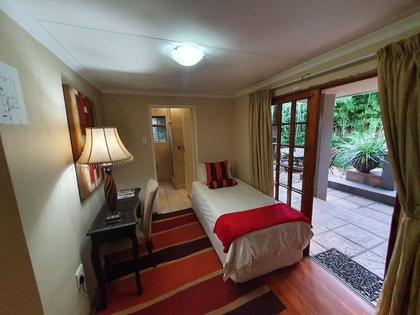 Imagen de la habitación del Hotel 7th Street Guesthouse. Foto 3
