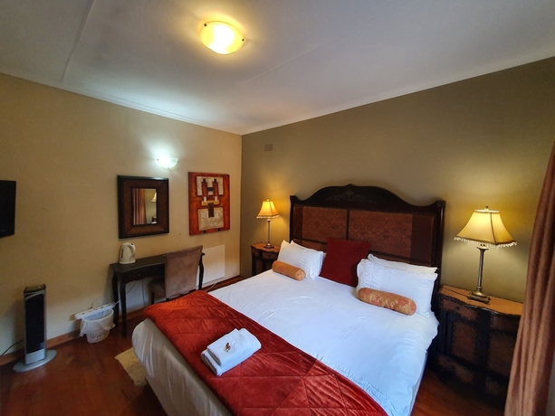 Imagen de la habitación del Hotel 7th Street Guesthouse. Foto 4