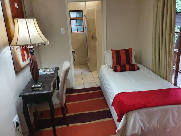 Imagen de la habitación del Hotel 7th Street Guesthouse. Foto 5
