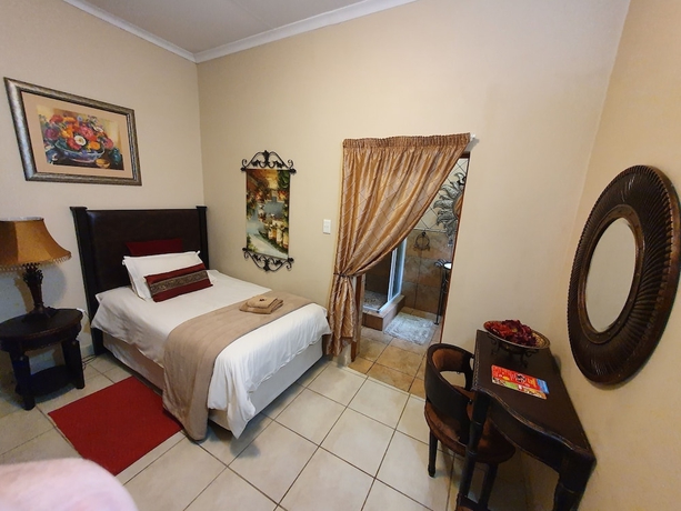 Imagen de la habitación del Hotel 7th Street Guesthouse. Foto 6