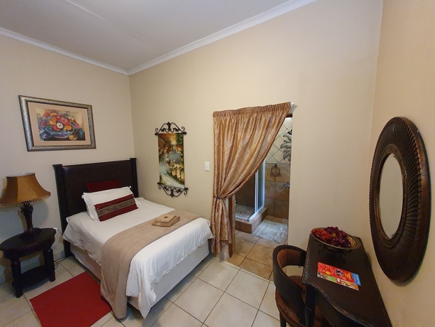 Imagen de la habitación del Hotel 7th Street Guesthouse. Foto 7