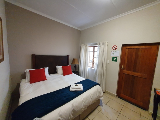 Imagen de la habitación del Hotel 7th Street Guesthouse. Foto 9